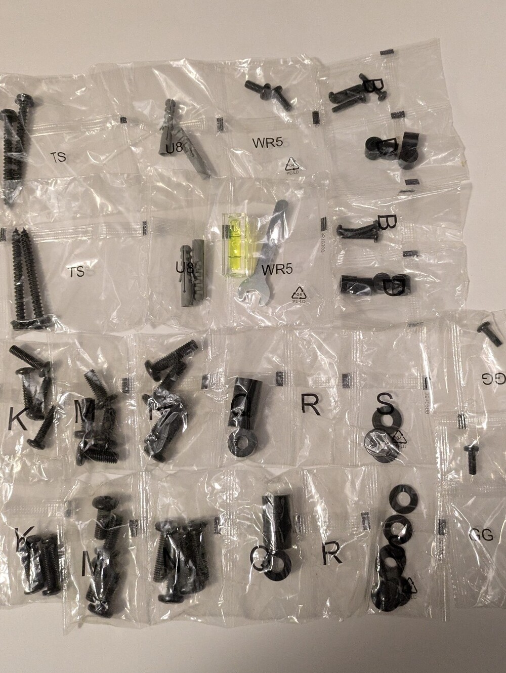 Hardware Nuts Bolts Screws Fittings Wrench and Level